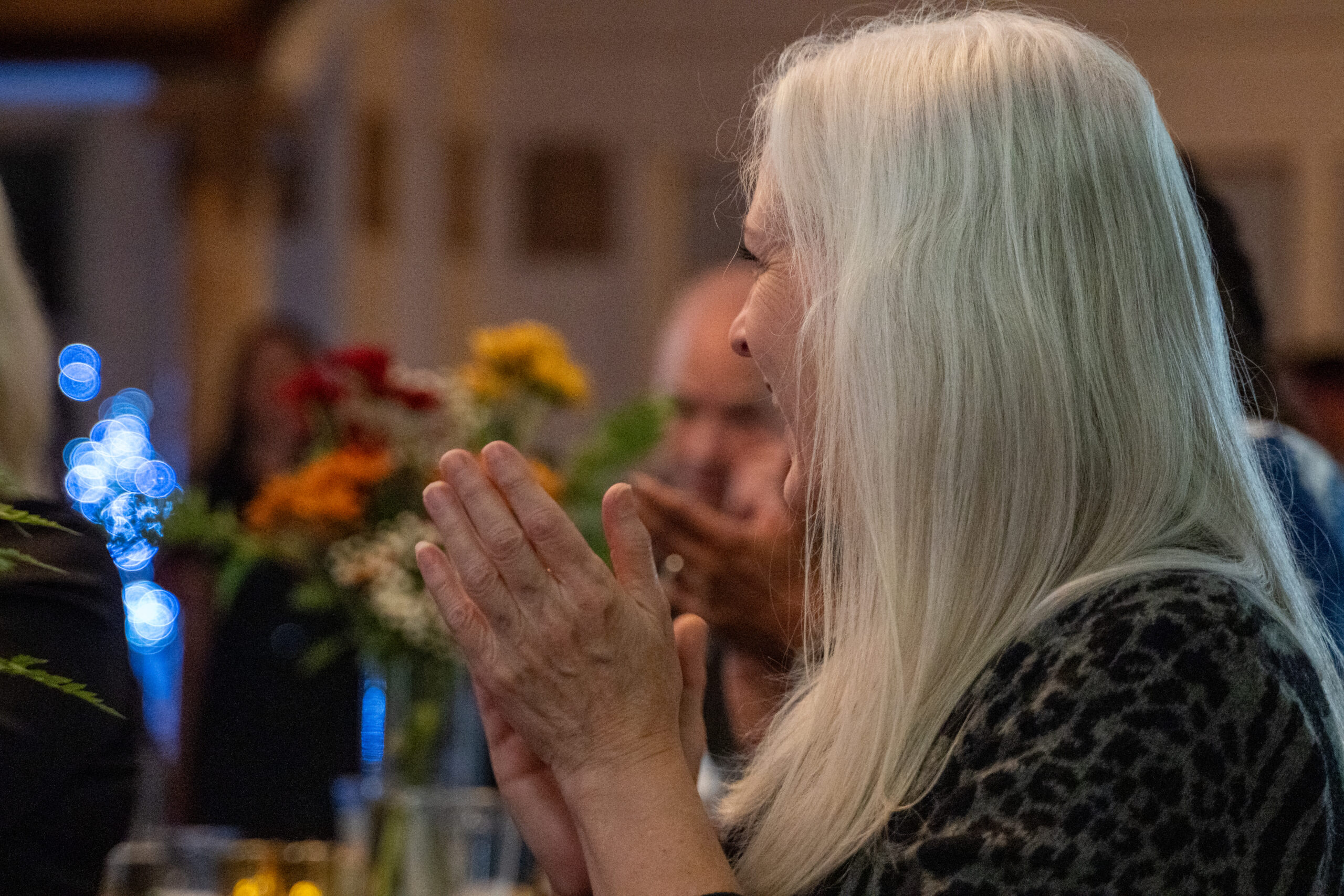 Guests raising a glass during the toast