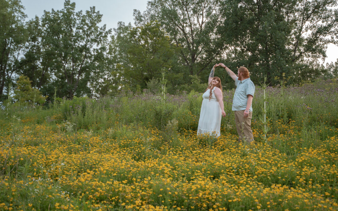 Timeless outdoor engagement portrait in a flower field in Davenport Iowa